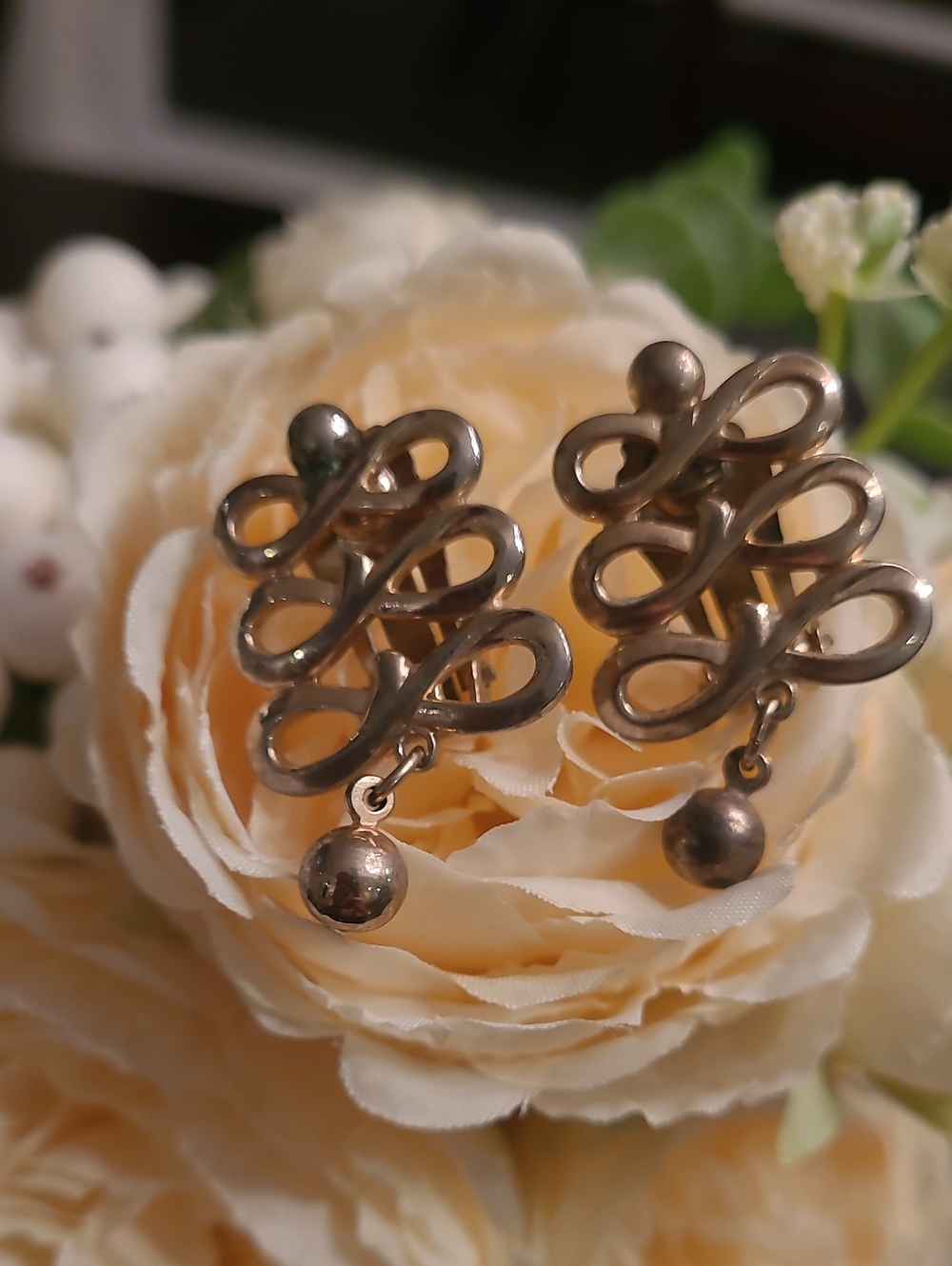 Barclay Elegant Swirl Drop Clip-On Earrings in Metallic Bronze